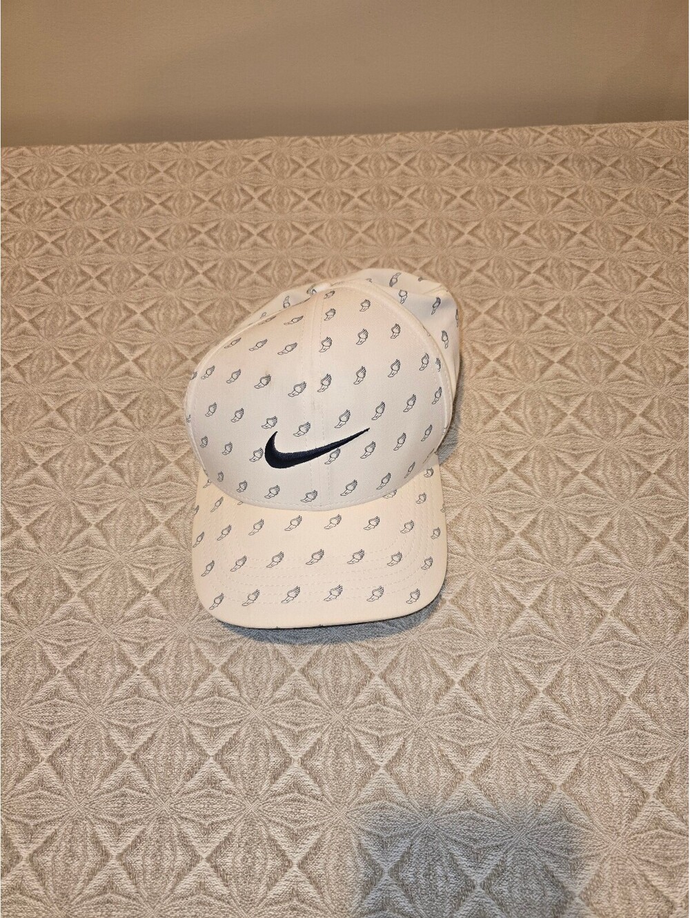 Nike White and Black Golf Visor Hat with Logo Pattern